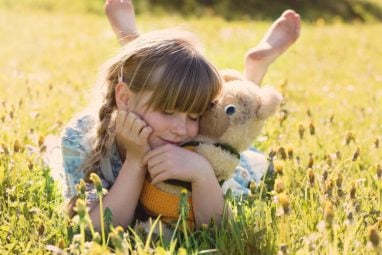 Girl with teddy bear