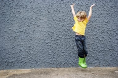 Boy jumping for joy 