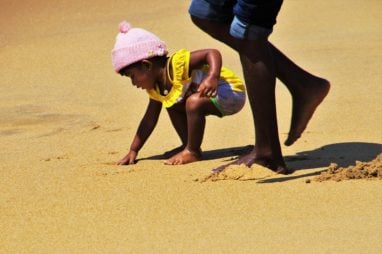 Fort Meyers child playing in the sand