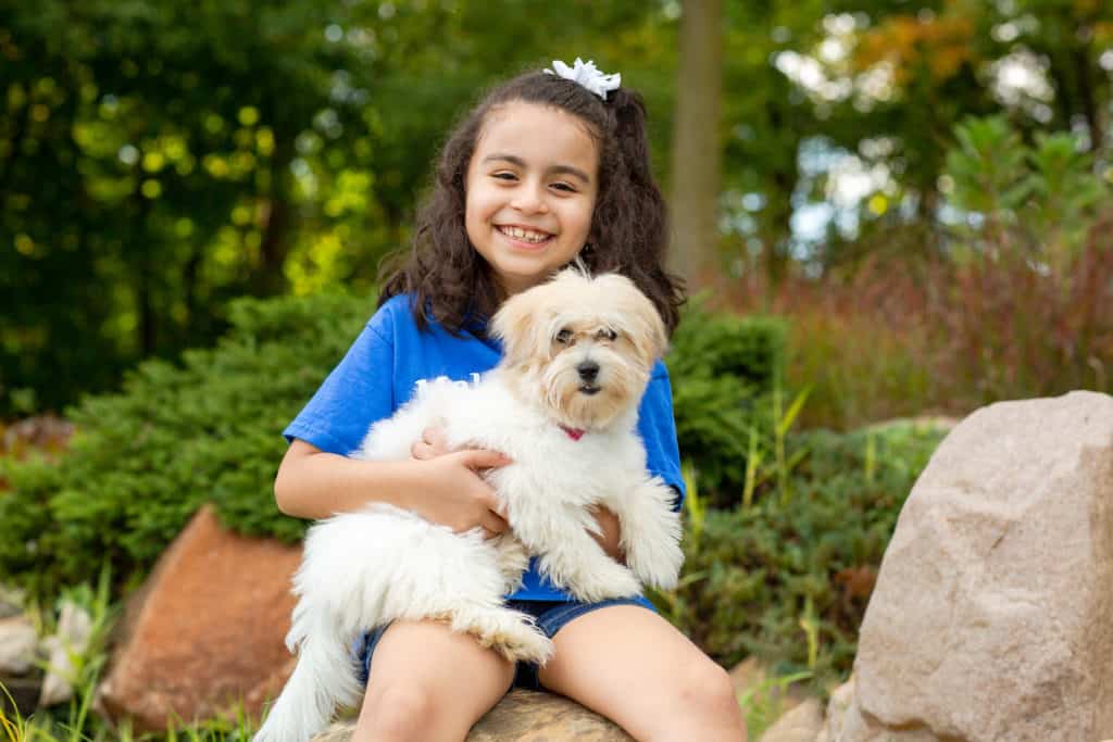 girl with puppy