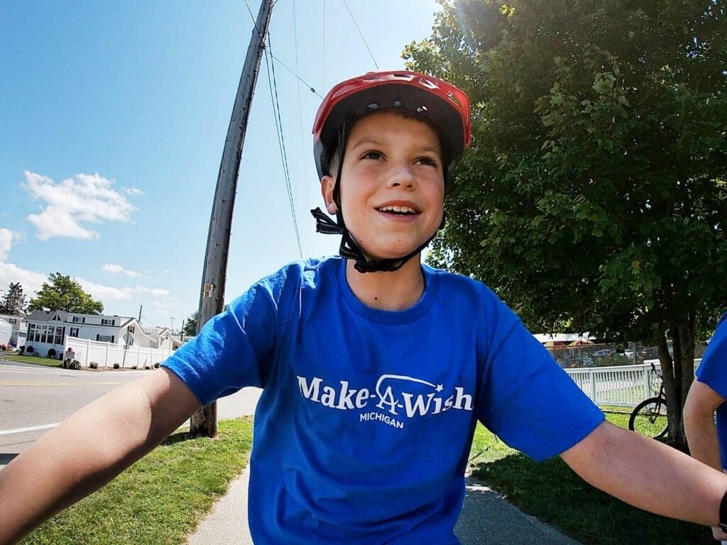 Make-A-Wish kid Joel riding a bike