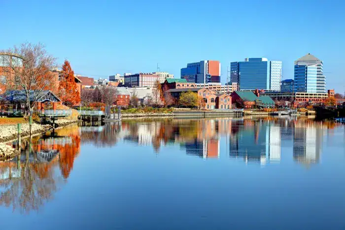 Skyline and reflecting water view of city in Delaware