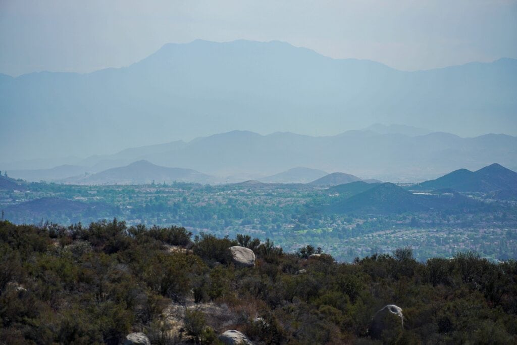 Hazy blue mountains over a valley
